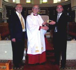 To mark the 40th anniversary of his Ordination, the Rev Canon William Bell received a surprise presentation from Geoffrey Simpson, Rector’s Churchwarden (right) and Jack Price, People’s Churchwarden (left).